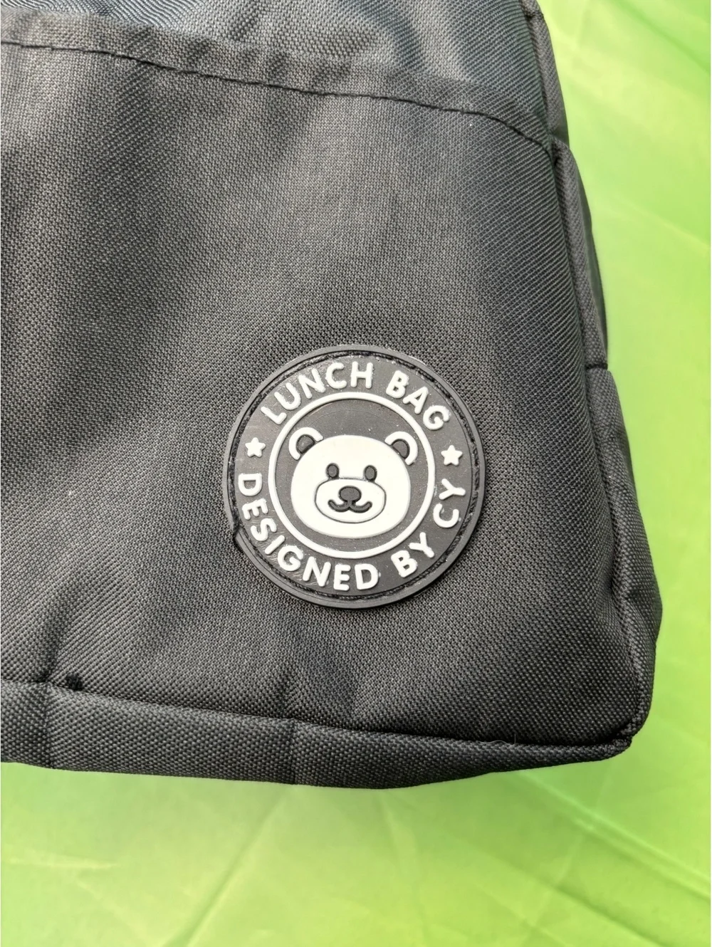 Black Lunch Bag with Floral 'E' Design and Bear Logo